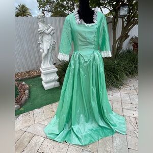 Elegant Mint Green Gown with Lace Trim